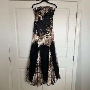Night Moves prom collection black and animal print mermaid dress